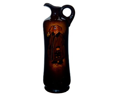 Dark brown glaze with full body figure portrait in relief.Bottom base restored. Unmarked. Issued: 1909Dimensions: 11"HManufac