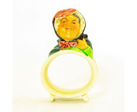 Ceramic napkin ring with a mini bust of Sairey Gamp on the top.Sarah or Sairey Gamp, Mrs. Gamp as she is more commonly known,