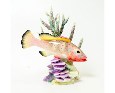 Hand painted porcelain; modeled as a colorful fish among coral.Royal Worcester backstamp. Artist: Ronald Van RyuckeveltIssued