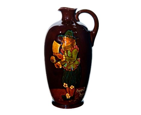 Dark brown glaze with portrait in front and inscription reading OYEZ OYEZ.Royal Doulton backstamp on bottom. Dewar's whisky l