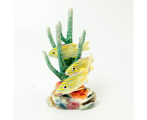 Hand painted porcelain; modeled as a grouping of yellow fish with blue stripe marks among coral.Royal Worcester backstamp. Ar