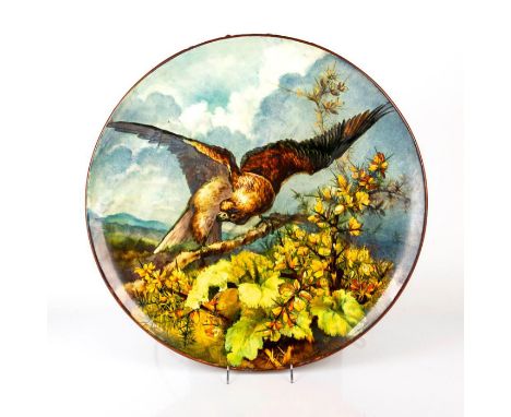 Extremely large and impressive charger depicts an eagle against a blue, green and yellow ground.Piece attributed to Florence 