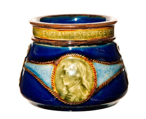 Luscious deep blues are used in this unique cream pitcher. Lord Nelson is featured on one side and his ship on the other with