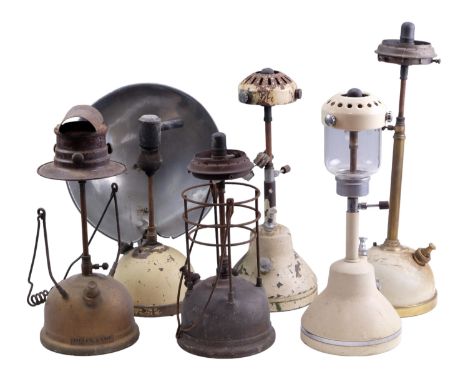A Bialaddin paraffin lamp, model T10, together with five paraffin heaters