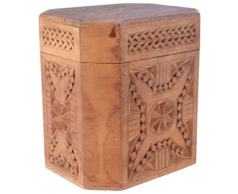 A mid-to-late 20th Century fruit-wood tea caddy, partly decorated with geometric carving and having a foil lining, 12 x 9 x 1