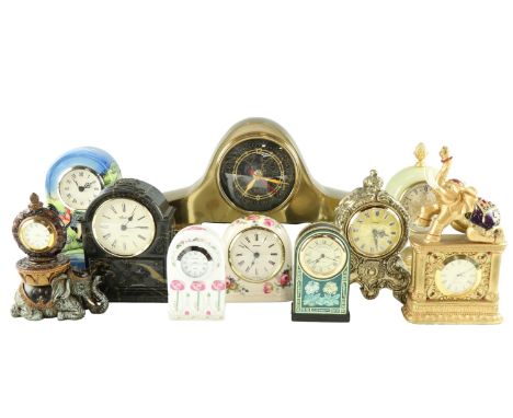 An Old Tupton Ware mantle clock, 16 cm, together with other mantle and boudoir clocks