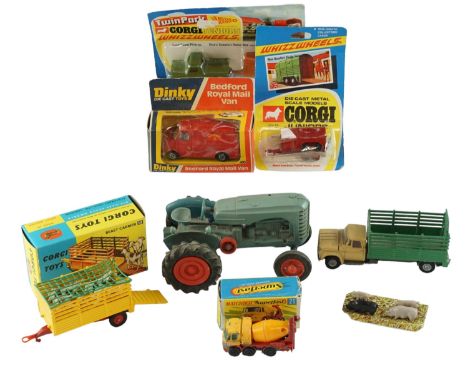 A group of diecast cars and other toy vehicles, including a Corgi Beast Carrier (58), a Corgi Juniors Whizzwheels Land Rover 