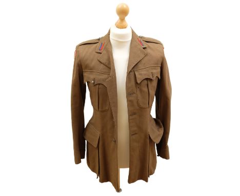 A Second World War Free Polish Army officer's Service Dress tunic, bearing an inscribed tailor's label, (moth damage)
