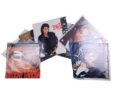 Nine Michael Jackson vinyl records, including a 12" single
