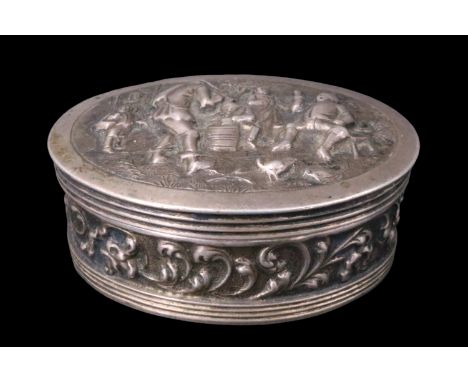 A 19th Century Dutch white metal pocket snuff or pill box, of oval section, its hinged lid relief decorated in depiction of a