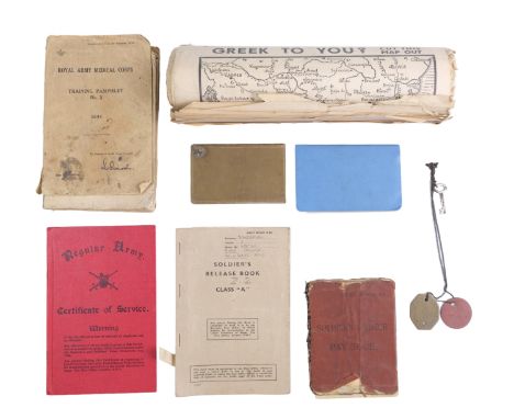 A Second World War Royal Armoured Corps trooper's service documents and identity discs, together with a 1944 RAMC training pa