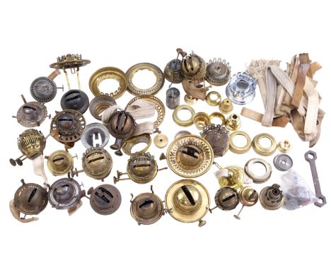 A quantity of oil lamp parts, including 20 burners, galleries, wicks, etc