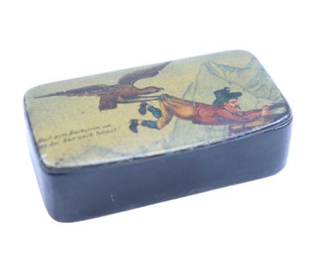 A mid-to-late 19th Century Austrian lacquered mache pocket snuff box, its lid bearing a comical lithographic print of a man b