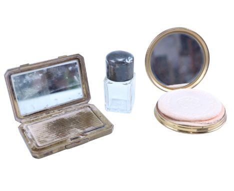 A vintage Stratton and one other powder compact, together with an Edwardian silver topped faceted glass scent bottle, Birming