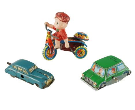 A Japanese key-wound tinplate tricycle toy, circa 1940/1950s, together with a similar Mini Cooper S Mk II, and one other car,