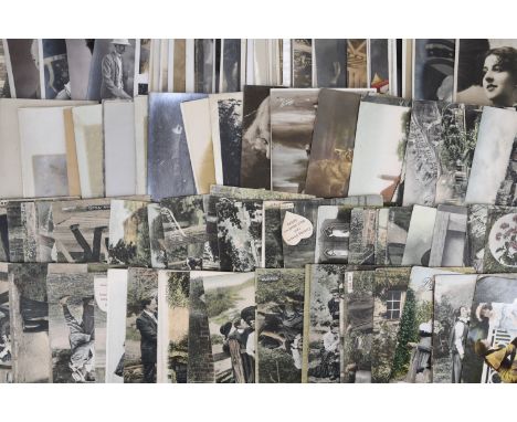 Approximately 100 Edwardian and later postcards, sentimental and portrait