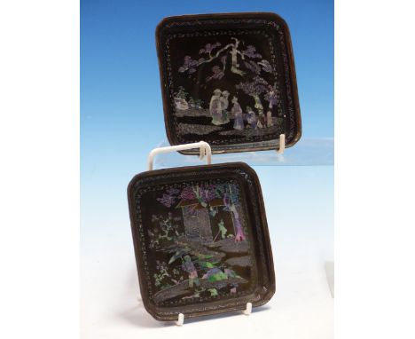 A PAIR OF LAC BURGAUTE SQUARE TRAYS, THE METAL MOUNTED RINGS ENCLOSING MOTHER OF PEARL FIGURES IN GARDENS AND BY A PAVILION O