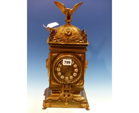 A BRASS CASED JAPY FRERES PENDULUM CLOCK STRIKING ON A COILED ROD, THE CASE SURMOUNTED BY A SPREAD EAGLE, THE ENAMEL ARABIC N