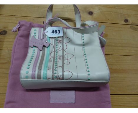 A RADLEY CREAM LEATHER HANDBAG SEWN WITH FLOWER HEADS AND TURQUOISE, PINK AND BROWN LEATHER BANDS TOGETHER WITH A PINK TEXTIL
