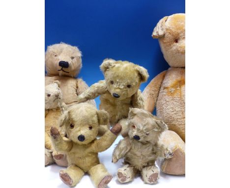 A COLLECTION OF SIX TEDDY BEARS, POSSIBLY MERRYTHOUGHT OR CHAD VALLEY, THE LARGEST.   H 70cms TOGETHER WITH A FURTHER GROUP O