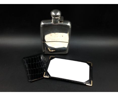 A BLACK LEATHER NOTE CARD HOLDER WITH ROLLED GOLD CORNERS SIGNED M&amp;Co, A MATCHING FOLD OVER NOTE PAD FITTED WITH A SILVER