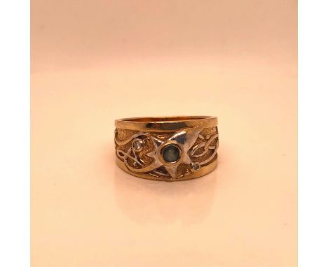 FOUR VARIOUS 9ct GOLD RINGS TO INCLUDE AN OVAL SIGNET RING SIZE T 1/2, A BLUE TOPAZ AND DIAMOND CARVED BAND SIZE K,  A THREE 