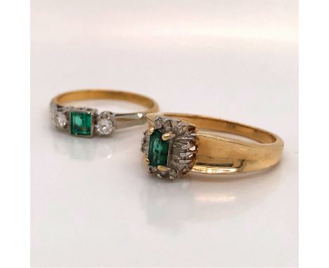 AN 18ct EMERALD AND MULTI DIAMOND CLUSTER RING FINGER SIZE M 1/2 TOGETHER WITH AN 18ct AND PLATINUM THREE STONE EMERALD AND D