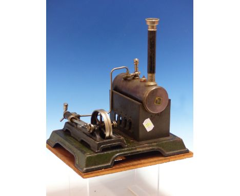 A MARKLIN STEAM ENGINE MOUNTED WITH DRIVE WHEEL ON A GREEN PAINTED PLATE TOGETHER WITH A FUNNEL AND SINGLE HANDLED POT, THE B