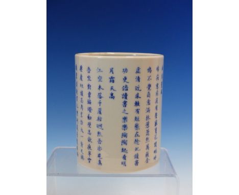 A CHINESE BLUE AND WHITE CYLINDRICAL BRUSH POT, THE EXTERIOR WITH SCRIPT AND UNDERGLAZE RED SEAL MARK.   H 12.5cms.