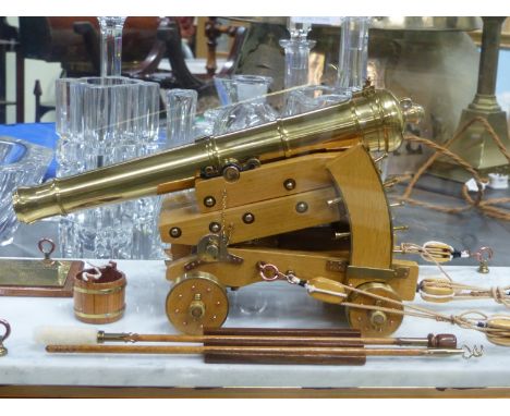 VIVIAN PENTECOST'S 1992 1/9TH SCALE MODEL OF LT KOEHLER'S 1782 DOWNHILL CANNON, THE BRASS COPPER AND WOOD CANNON WITH DEPRESS