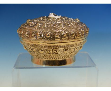 A CHINESE SILVER BOX AND COVER  WORKED WITH BANDS OF RAISED CABOCHONS AND ROUNDELS.   Dia. 12.5cms. 188gms