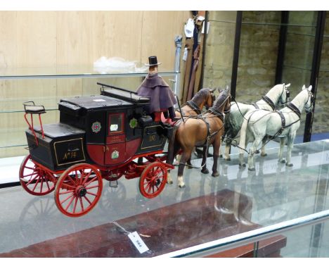 A SCALE MODEL LONDON TO YORK ROYAL MAIL COACH DRAWN BY A PAIR OF DAPPLED AND A PAIR OF BAY HORSES.   W 120cms.