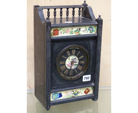 A VICTORIAN BLACK SLATE MANTLE CLOCK IN THE AESTHETIC TASTE WITH UNUSUAL PATENT WINDING MECHANISM.