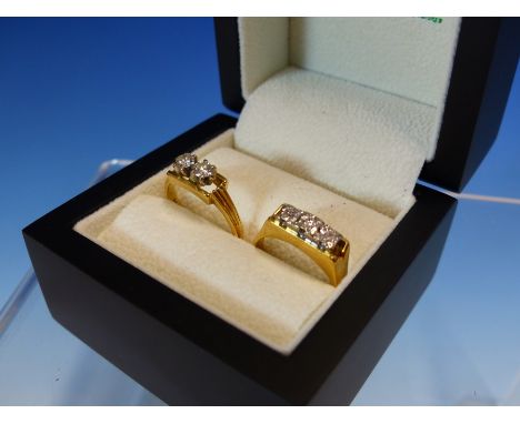 AN 18ct GOLD TWO STONE BRILLIANT CUT DIAMOND CLAW SET RING FINGER SIZE M, TOGETHER WITH A THREE STONE DIAMOND ILLUSION SET RI