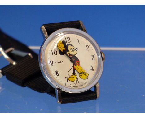 A VINTAGE MANUAL WOUND TIMEX MICKEY MOUSE WRIST WATCH. INCLUDED ARE PHOTOGRAPHS FROM A RECENT OVERHAUL.