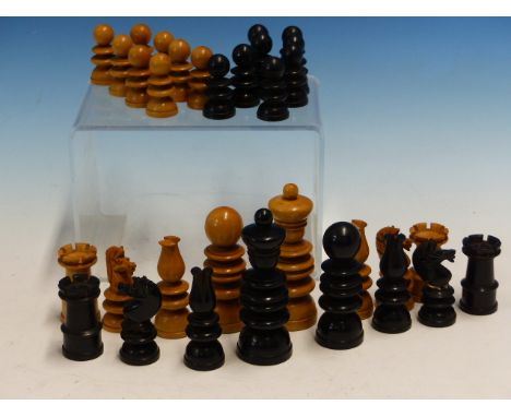 A MAHOGANY BOXED EBONY AND BOX WOOD RING TURNED CHESS SET, THE KINGS.   H. 8.5cms.