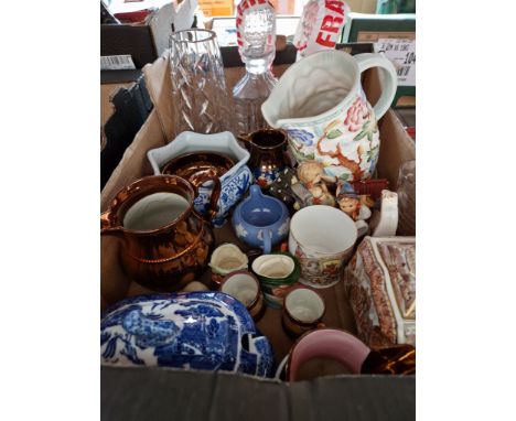 A mixed lot pottery and glass including Wedgwood, glass decanters, Goebel figures, Toby jugs, etc. 