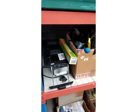 A quantity of fish aquarium equipment including a pump, programmable light etc. 