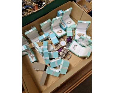 A box of mainly boxed rings, watches, earrings, silver cat brooch, a silver carriage with horse brooch, etc. 