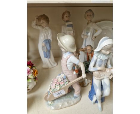 Lladro wheelbarrow boy, four Nao figures and a Capodimonte figureCondition (wheelbarrow boy only):- appears to be only one sm