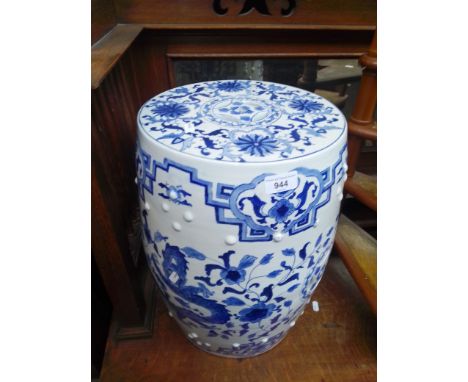 A Chinese blue and white ceramic garden stool. 