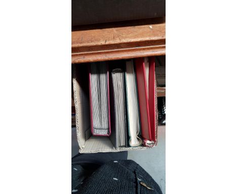 Five stamp albums including Commonwealth, birds, etc. 