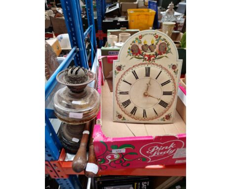 A Continental wall clock with brass weights, 2 walking canes and an oil lamp - no funnel or shade. 
