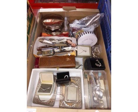 A mixed lot comprising costume jewellery, silver plated items, picture frames, trinket boxes, etc. 