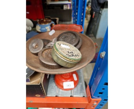 A vintage cast metal set of weighing scales with tray and weights. 