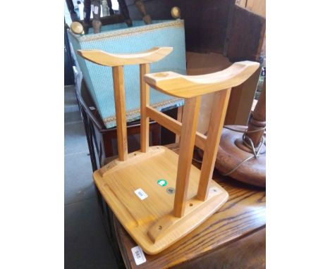 An Ercol light elm occasional table. 