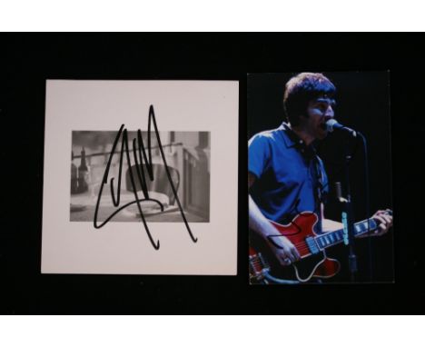 LIAM AND NOEL SIGNED - a postcard from Malmaison signed by Liam and a signed photograph of Noel playing guitar on stage. Both