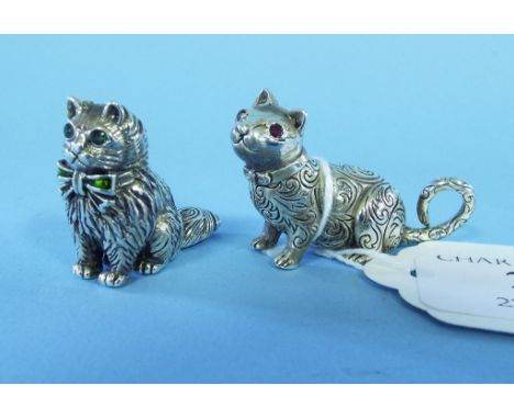 A miniature silver cat, with ruby eyes, and another (2)