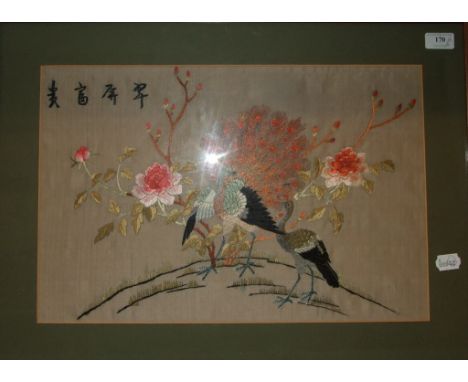 A pair of Chinese silk embroidered pictures, 32 x 49 cm, a milk glass vase, a carved wood Buddha, a pottery figure, and a woo