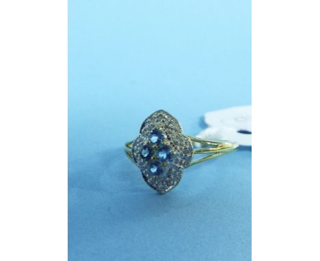A 9ct gold, blue topaz and diamond ring